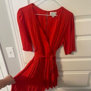 Jun and Ivey red romper in size medium from Francesca’s